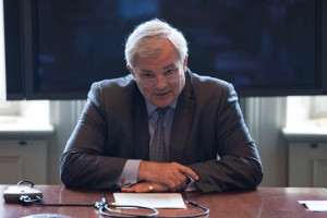 Man seated at desk