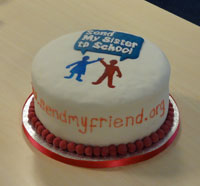 Cake, iced with Send My Sister to School logo