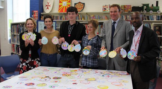 Assistant Headteacher Alison Baker with Sixth Formers Joel Passmore, Georgia Mahoney and Amy Lavery, MP Nick Herbert and visiting teacher Johnson Nsabimana.