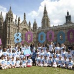 Over 50 children outside the UK Houses of Parliament calling for action to send every child to school.