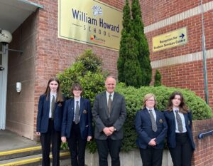Jaimie, Cat and students at William Howard with local MP Dr Neil Hudson